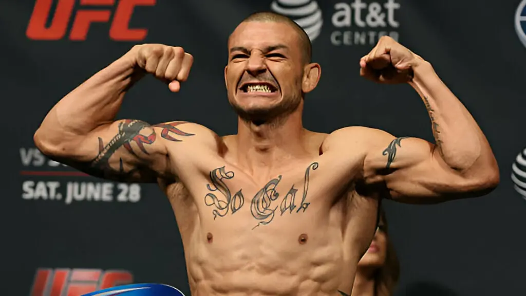 UFC Fighter Cub Swanson steps on the scale during the UFC Fight Night weigh-in