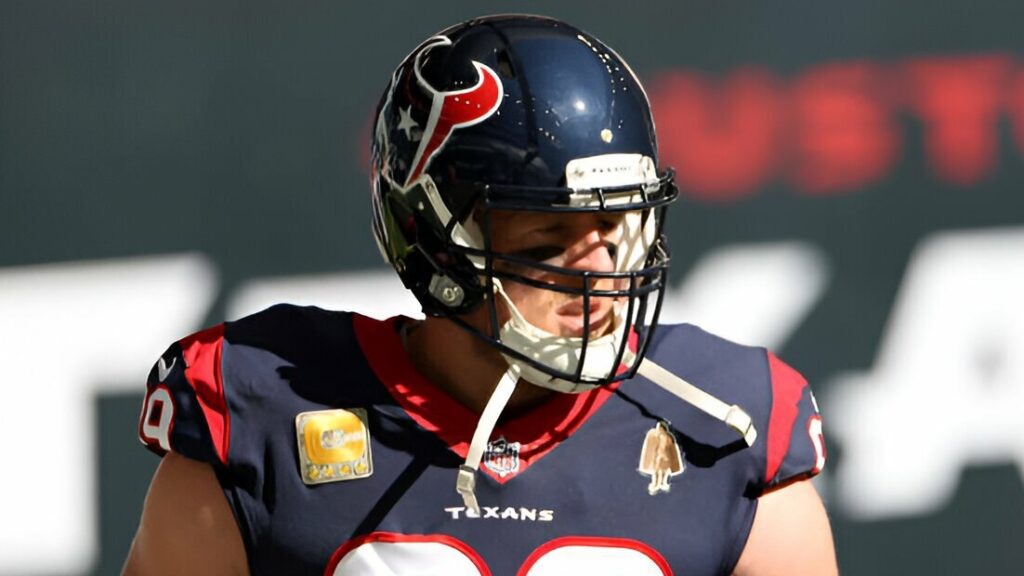 Former Houston Texans star defensive end J.J. Watt looks on before their game against the New England Patriots