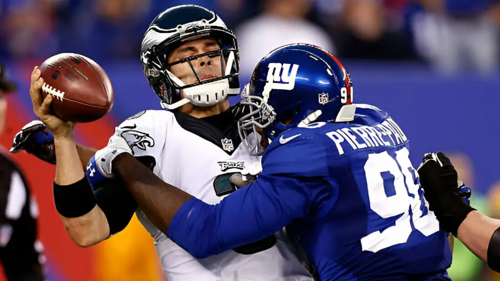 New York Giants defensive end Jason Pierre-Paul sacks Philadelphia Eagles quarterback Mark Sanchez during a game