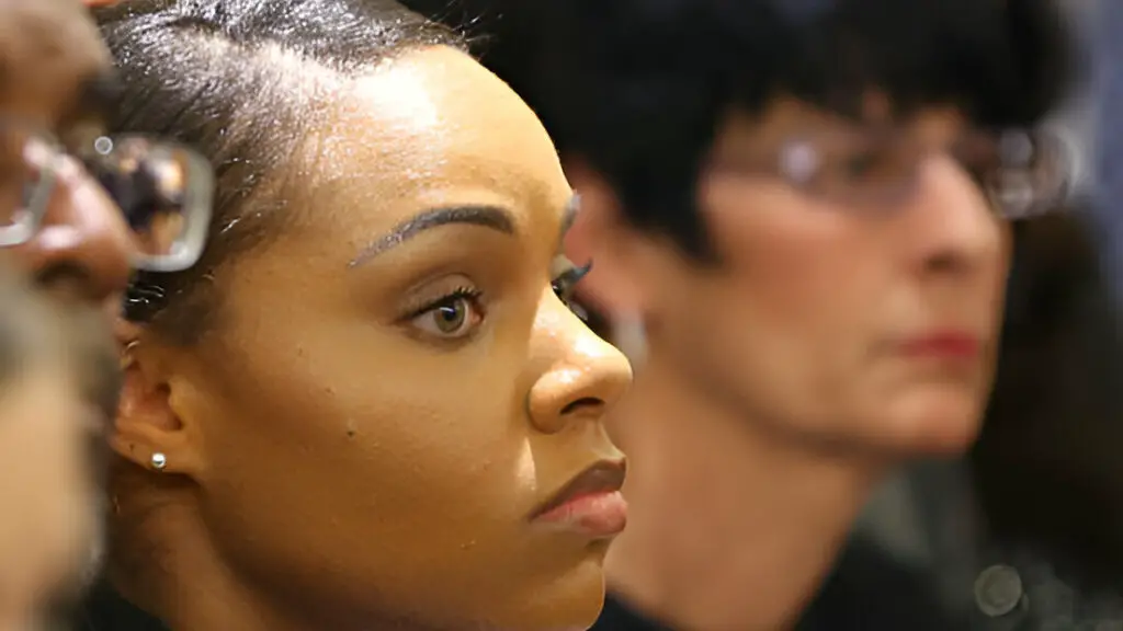 Aaron Hernandez's ex-fiancee Shayanna Jenkins and her mother Terri Hernandes listen to the judge give instructions to the jury in the closing arguments in the Aaron Hernandez trial for the murder of Odin Lloyd
