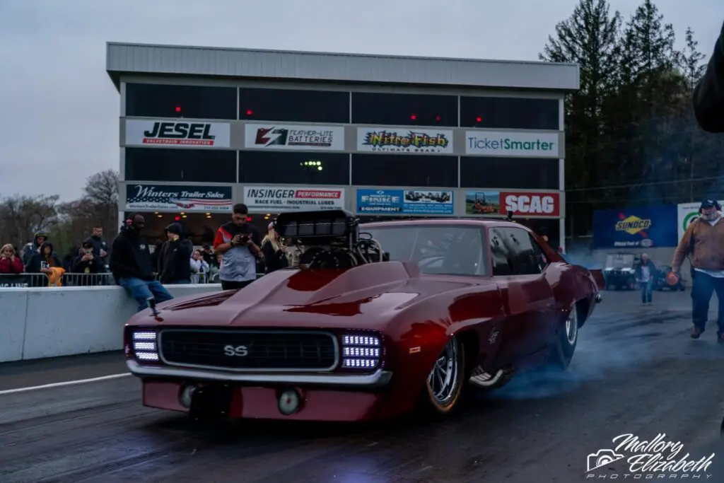 Street Outlaws No Prep Kings star Justin Swanstrom doing a burnout before a race at Maple Grove Raceway