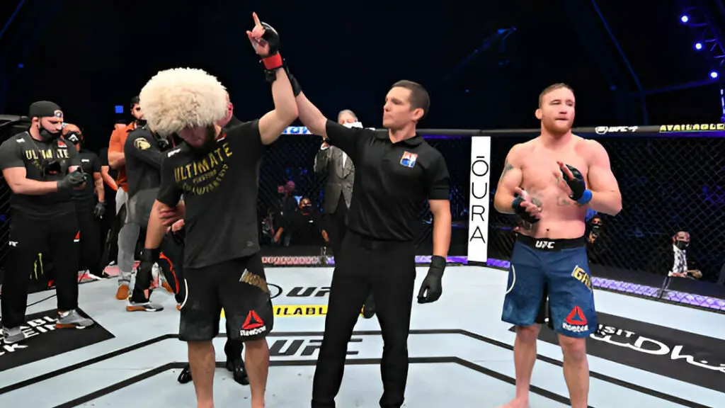 UFC star Khabib Nurmagomedov celebrates his victory over Justin Gaethje in their lightweight title bout during the UFC 254 event