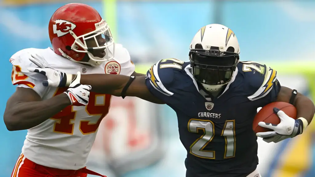 San Diego Chargers running back LaDainian Tomlinson carries the ball against the Kansas City Chiefs as Bernard Pollard tries to tackle him
