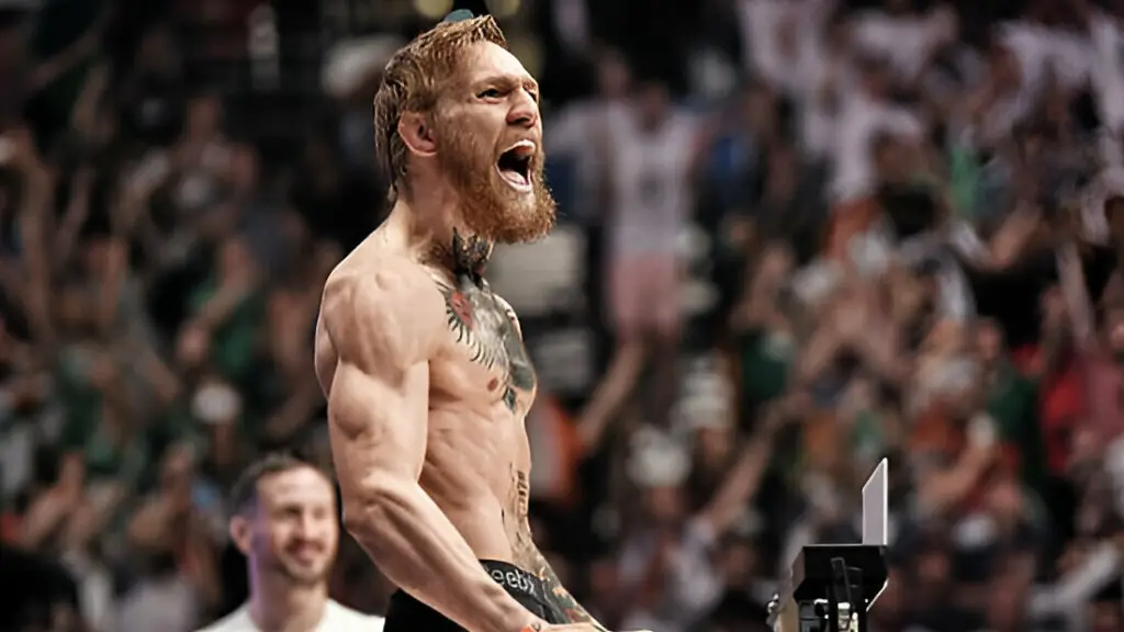 UFC featherweight Conor 'The Notorious' McGregor interacts with the crowd during the UFC 189 weigh-in