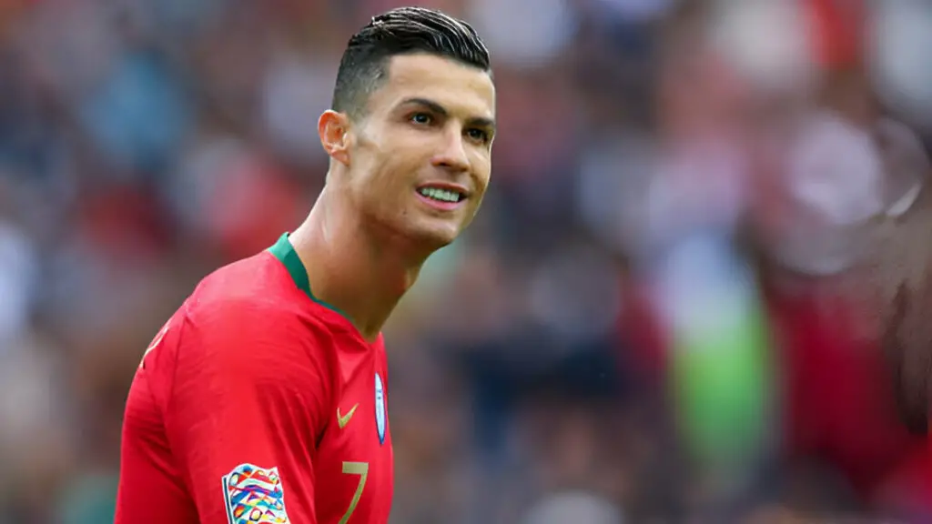Soccer star Cristiano Ronaldo looks on during the UEFA Nations League Semi-Final match between Portugal and Switzerland 