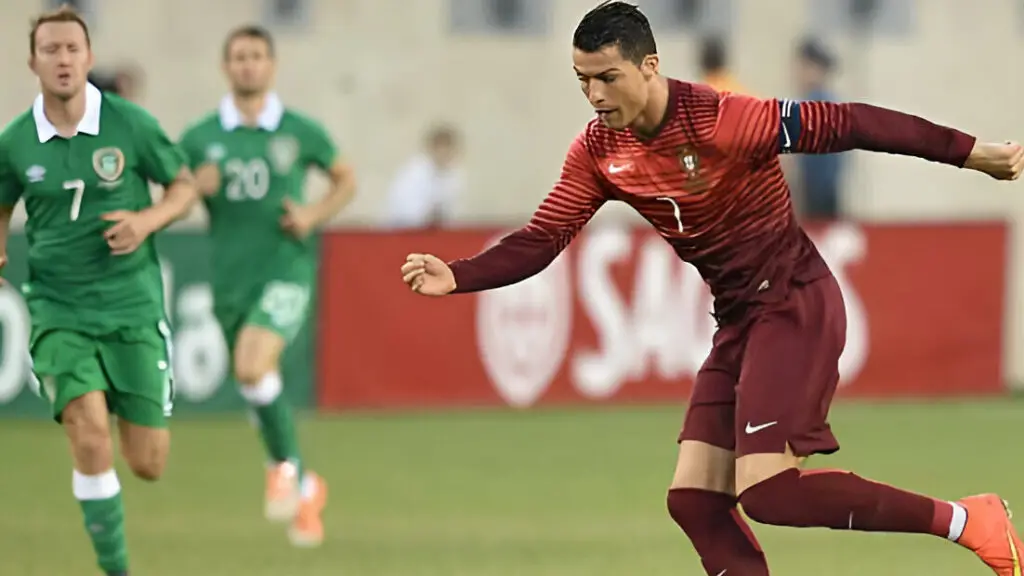 Soccer star Cristiano Ronaldo moves the ball against the Republic of Ireland during an international friendly match 