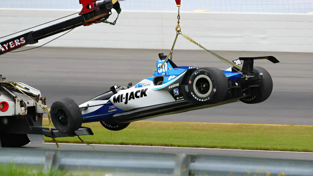 Rahal Letterman Lanigan Racing driver Takuma Sato has his car towed into the garage area after being involved in an accident during the IndyCar Series ABC Supply 500