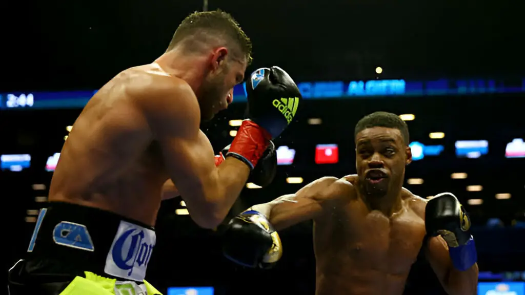 Boxer Errol Spence Jr. and Chris Algieri exchange punches during their welterweight bout