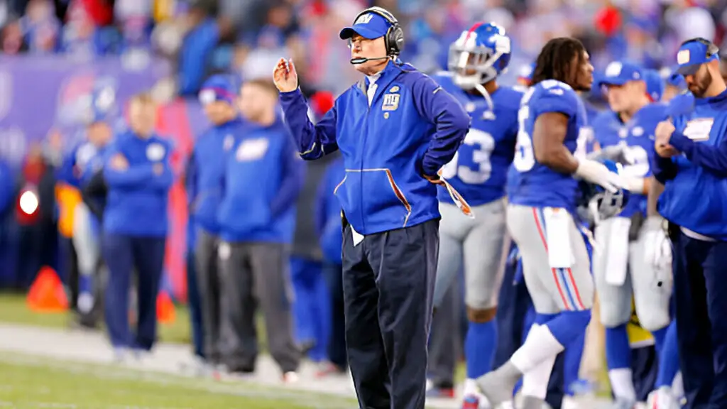 Former New York Giants head coach Tom Coughlin looks on against the Carolina Panthers