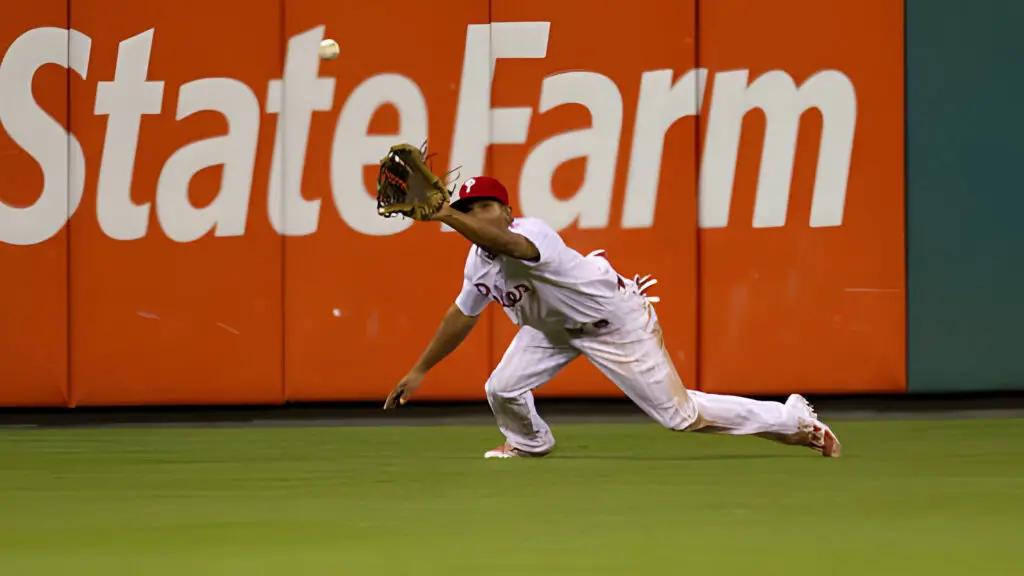 Philadelphia Phillies outfielder Ben Revere prepares to catch a fly ball against the Washington Nationals