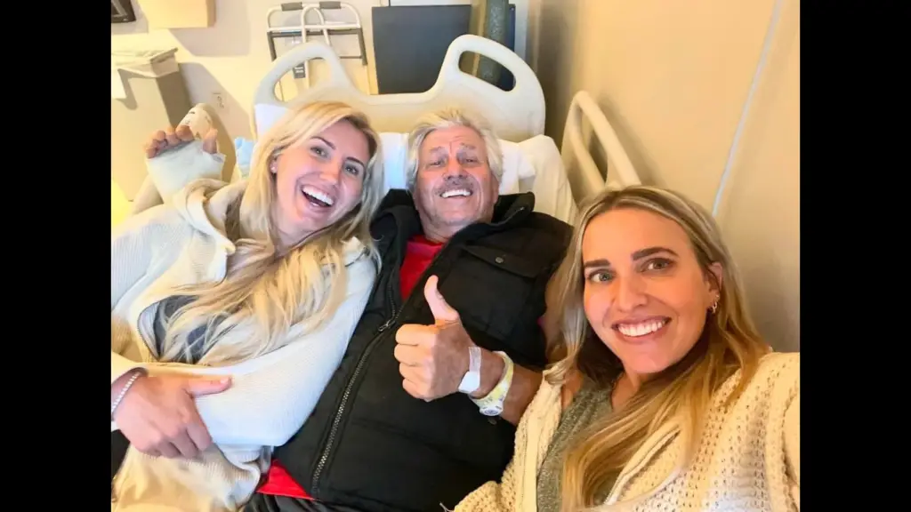 John Force Racing Top Fuel Dragster driver Brittany Force in the hospital with her sister Courtney visiting her legendary father John Force