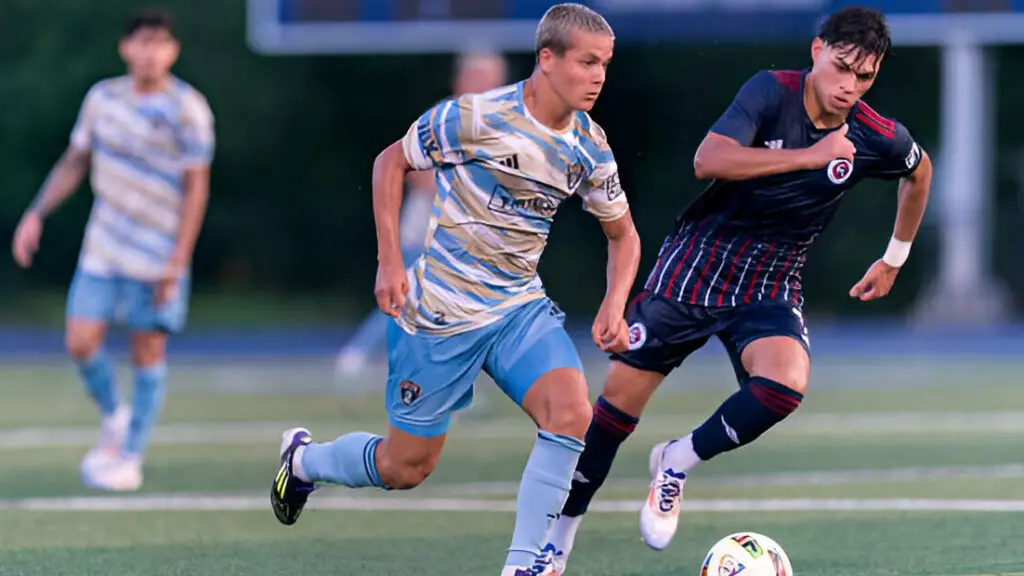 Philadelphia Union II star Cavan Sullivan looks to play the ball during a game between Philadelphia Union II and New England Revolution II