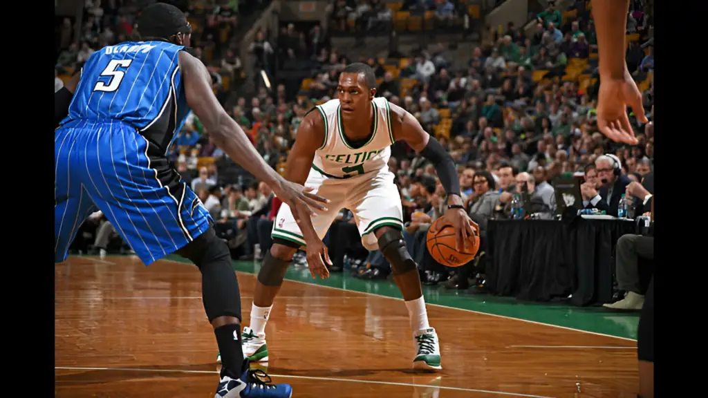 Boston Celtics guard Rajon Rondo handles the ball against the Orlando Magic during the game