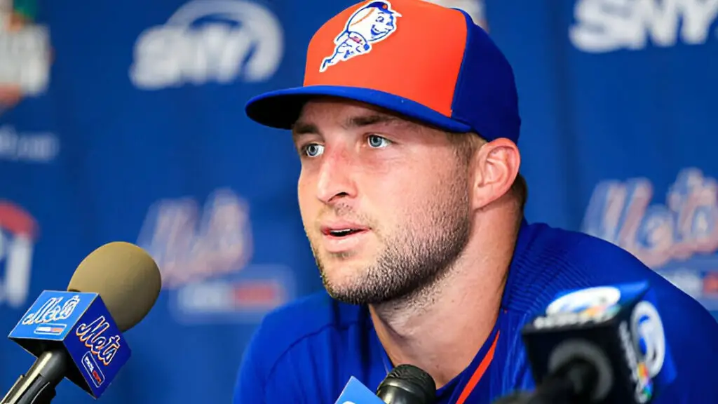 New York Mets prospect Tim Tebow speaks at a press conference after a work out at an instructional league day