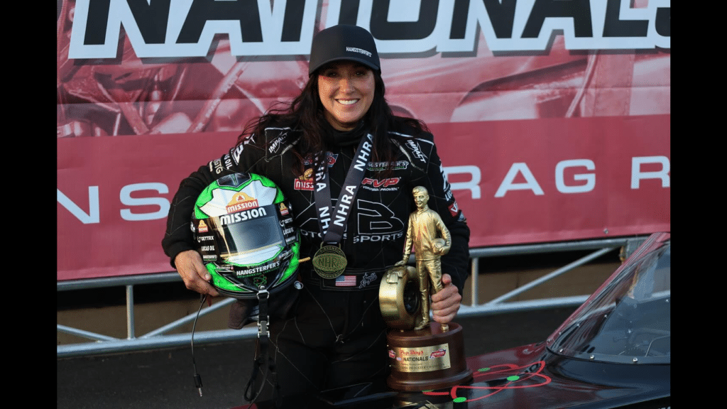 Michalek Brothers Racing Top Alcohol Dragster Angelle Sampey celebrates her first career Top Alcohol Dragster win