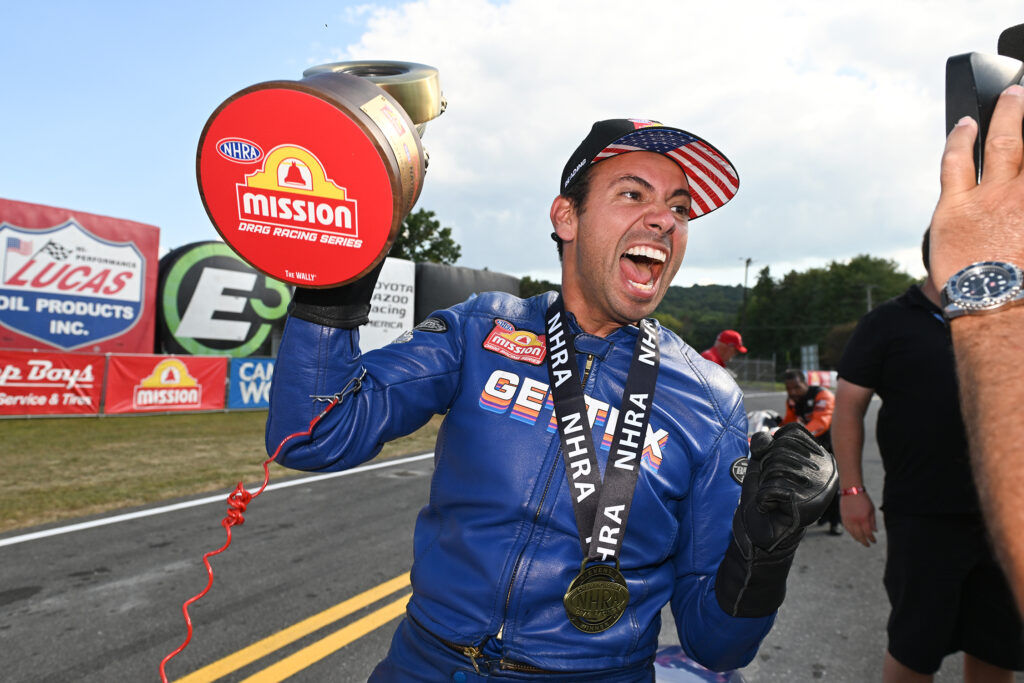 Pro Stock Motorcycle rider Hector Arana Jr. celebrates after he wins the Pep Boys NHRA Nationals at Maple Grove Raceway