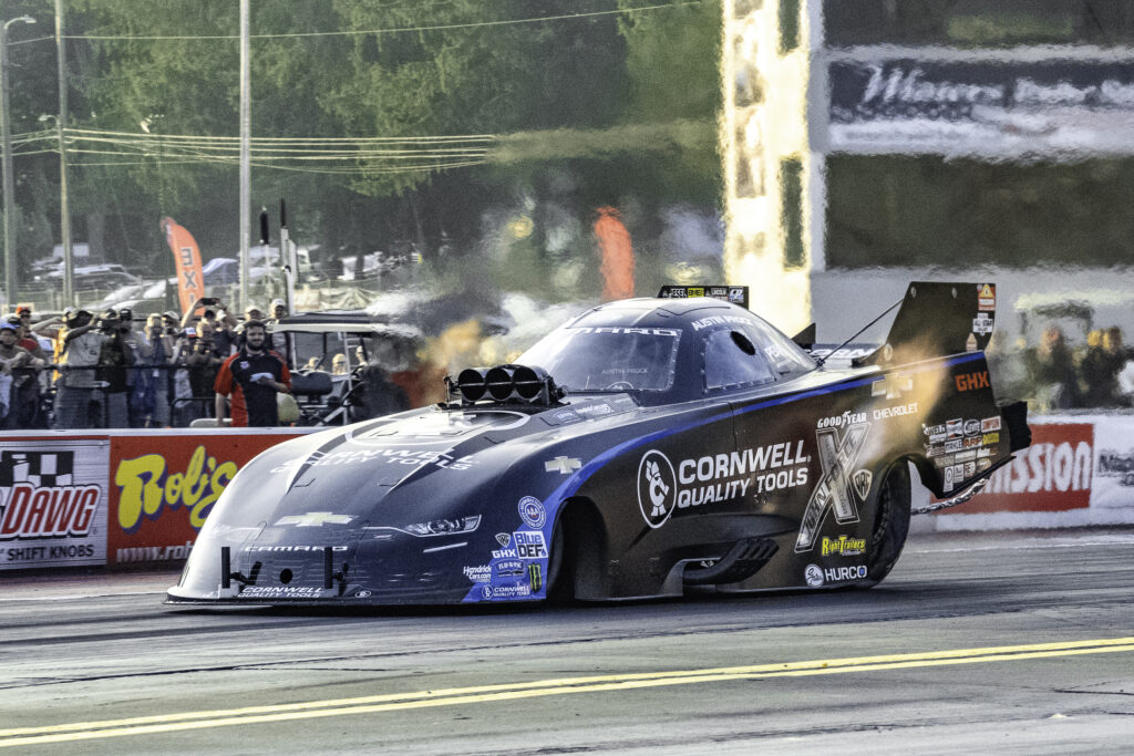 Cornwell Tools Funny Car driver Austin Prock making a pass during Saturday’s qualifying at the 39th annual Pep Boys NHRA Nationals