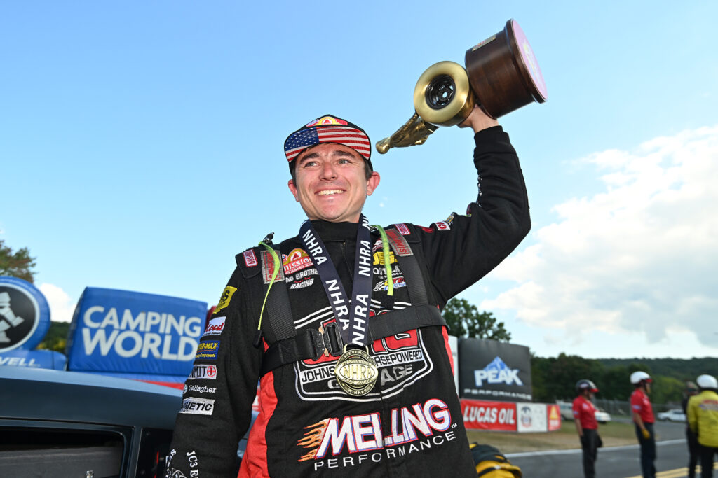 Pro Stock driver Aaron Stanfield celebrates his Pep Boys NHRA Nationals win at Maple Grove Raceway