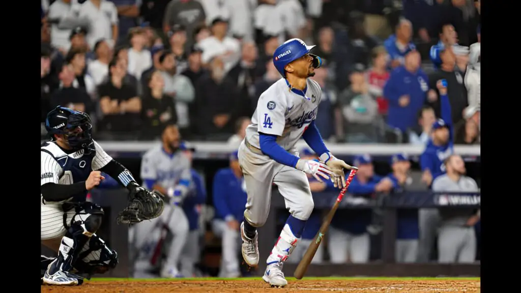 Los Angeles Dodgers star Mookie Betts hits a sacrifice fly in the eighth inning during Game 5 of the 2024 World Series presented by Capital One between the Los Angeles Dodgers and the New York Yankees