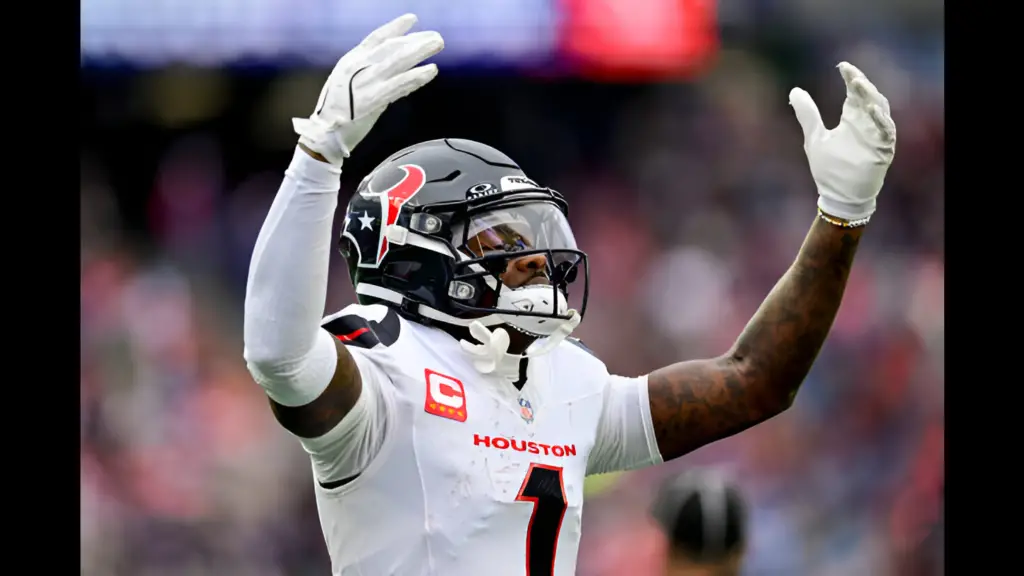 Houston Texans wide receiver Stefon Diggs celebrates after scoring a touchdown against the New England Patriots during the third quarter of the game