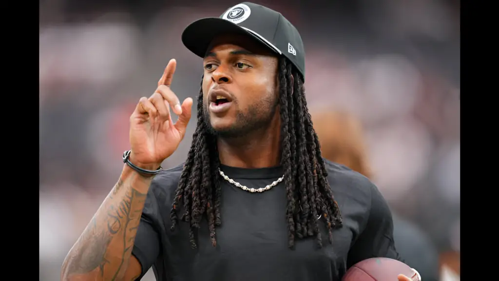 Former Las Vegas Raiders wide receiver Davante Adams looks on before the game against the Cleveland Browns