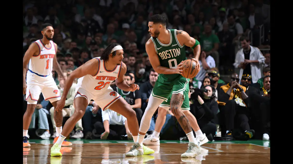 Boston Celtics star Jayson Tatum handles the ball during the game against the New York Knicks