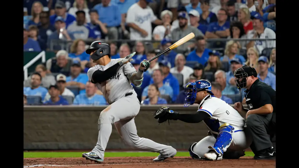 New York Yankees player Gleyber Torres hits an RBI single during the fifth inning against the Kansas City Royals during Game Four of the Division Series