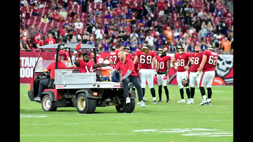 Tampa Bay Buccaneers wide receiver Chris Godwin reacts as he is carted off the field after being injured during the fourth quarter against the Baltimore Ravens