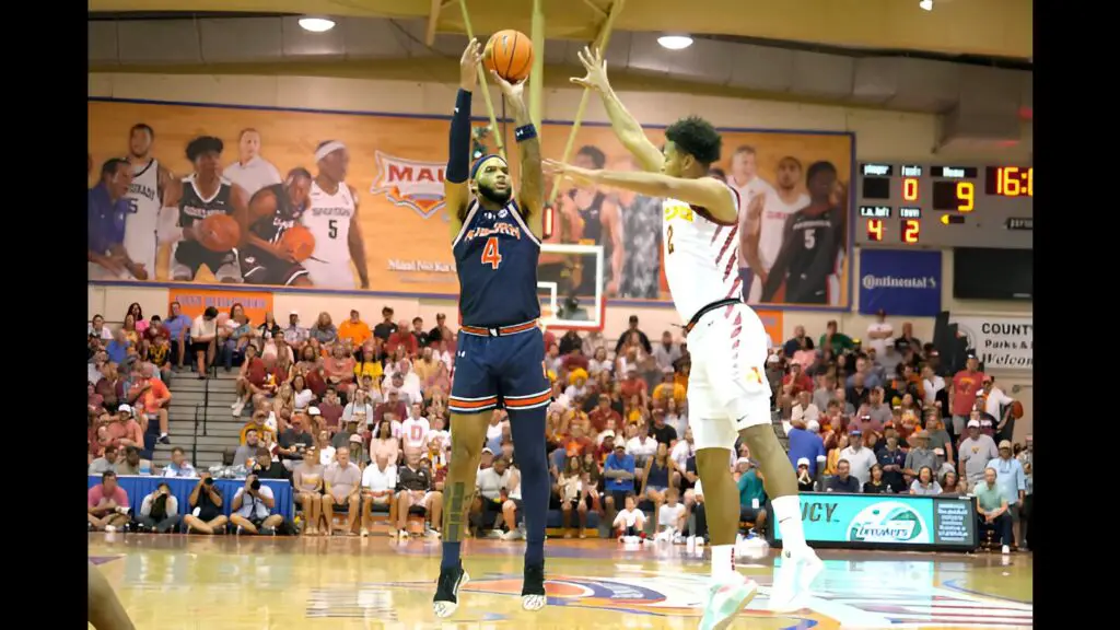 Auburn Tigers big man Johni Broome takes a shot over Joshua Jefferson against the Iowa State Cyclones in the first half during the Maui Invitational college basketball game