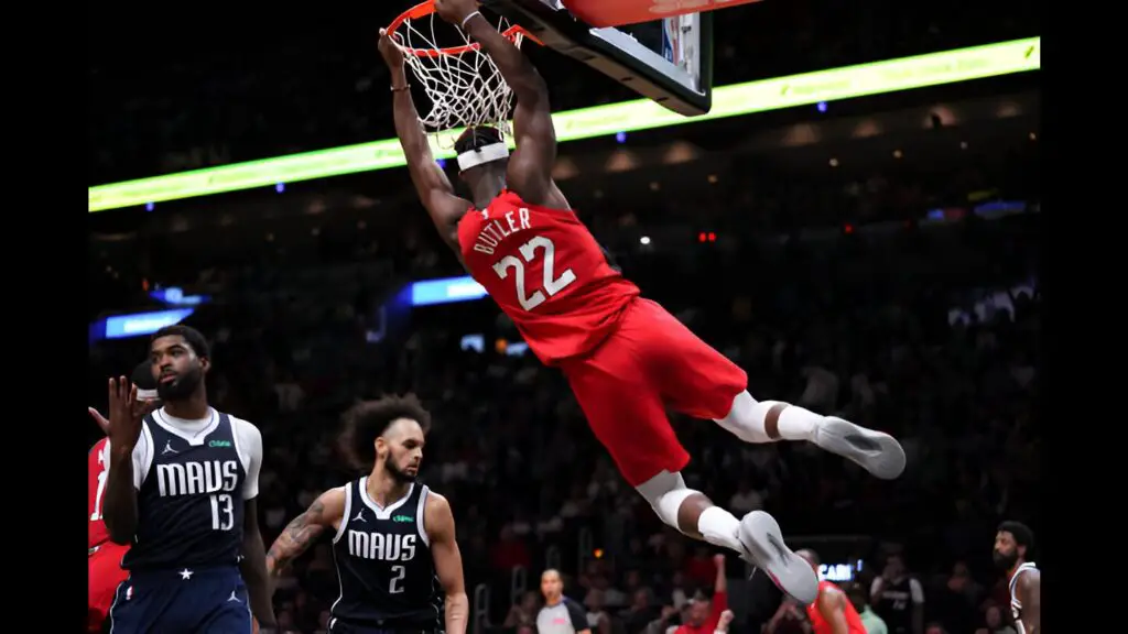 Miami Heat star Jimmy Butler dunks the ball against the Dallas Mavericks during the fourth quarter