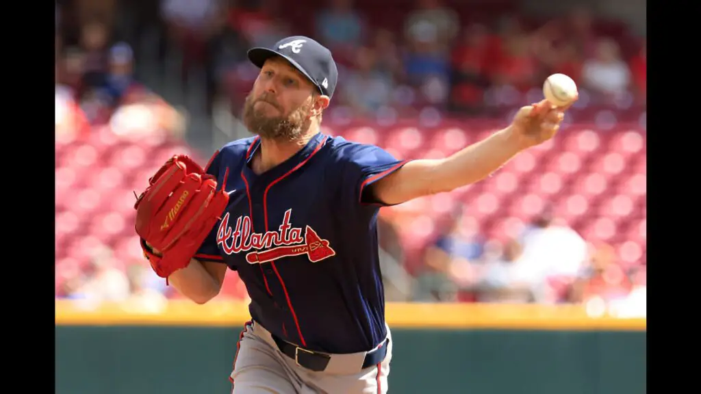 Atlanta Braves pitcher Chris Sale throws a pitch against the Cincinnati Reds