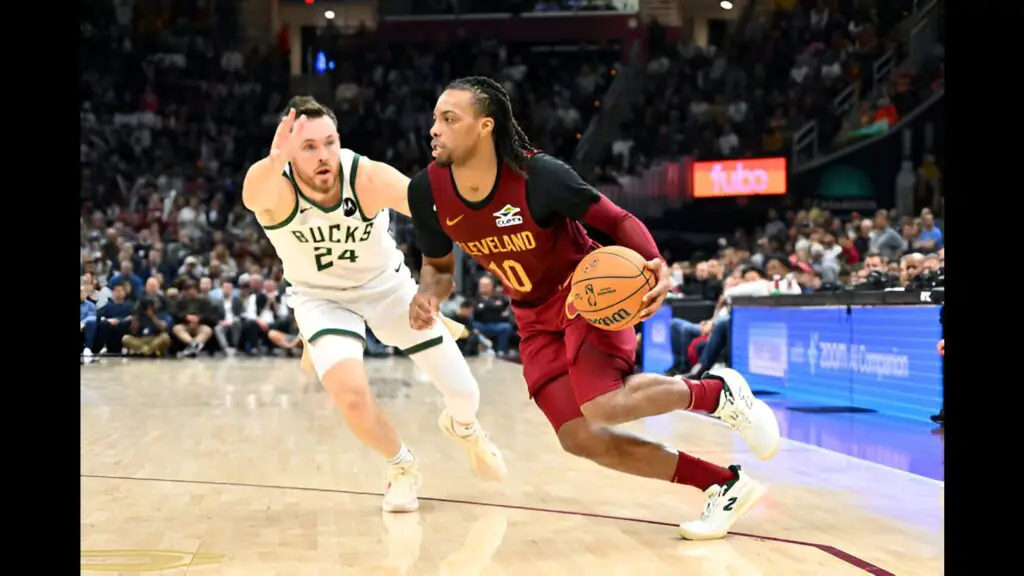 Cleveland Cavaliers guard Darius Garland goes to the basket around Pat Connaughton against the Milwaukee Bucks during the fourth quarter