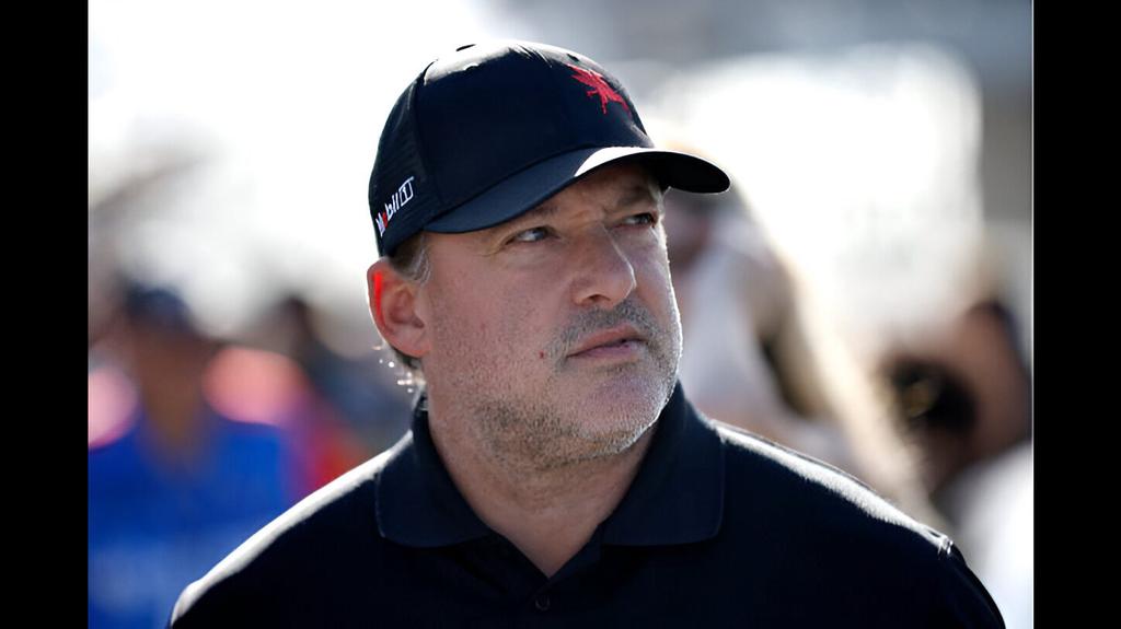 NASCAR Hall of Famer Tony Stewart looks on from the grid before the NASCAR Xfinity Series Contender Boats 300