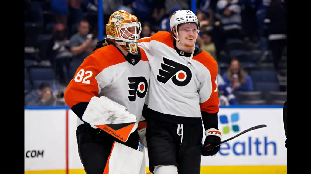 Philadelphia Flyers players Owen Tippett and Ivan Fedotov celebrate the shootout win against the Tampa Bay Lightning