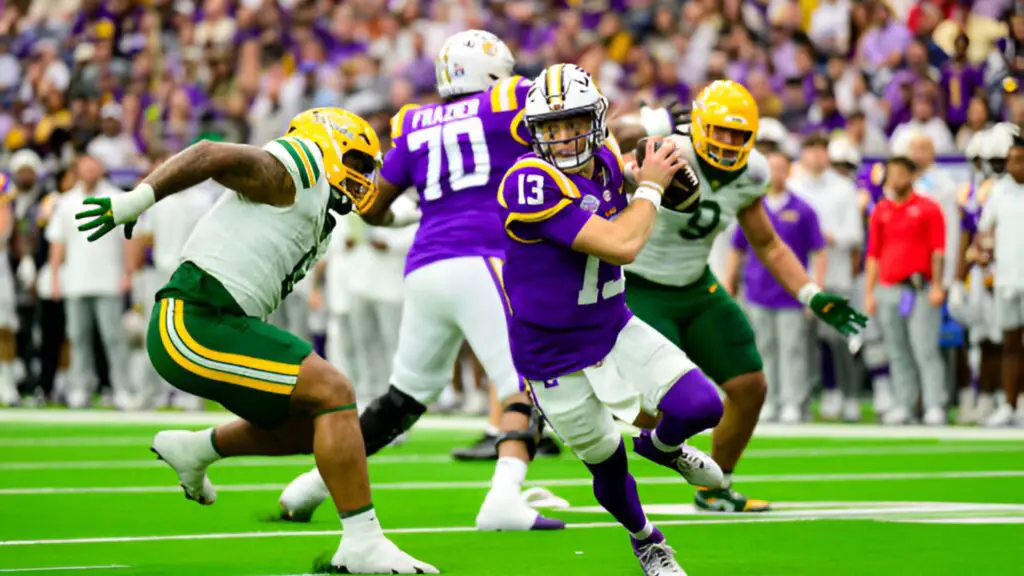 LSU Tigers quarterback Garrett Nussmeier evades a defender during the first half of the Kinder's Texas Bowl against the Baylor Bears