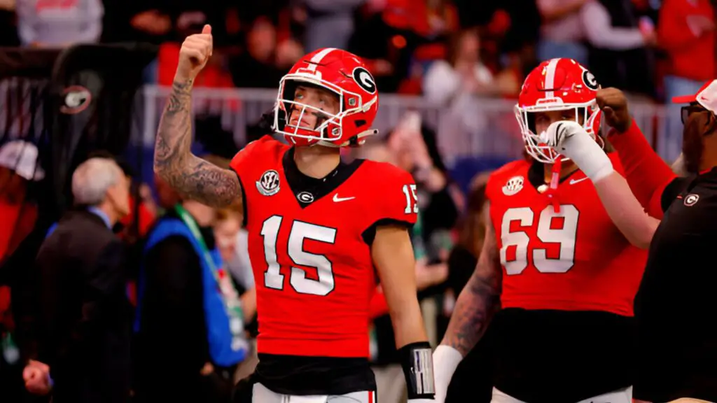 Former Georgia Bulldogs starting quarterback Carson Beck enters the field prior to the 2024 SEC Championship against the Texas Longhorns