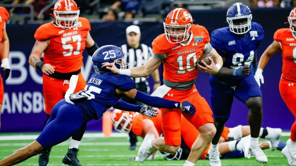 Sam Houston Bearkats quarterback Hunter Watson carries the football against the Georgia Southern Eagles in the New Orleans Bowl