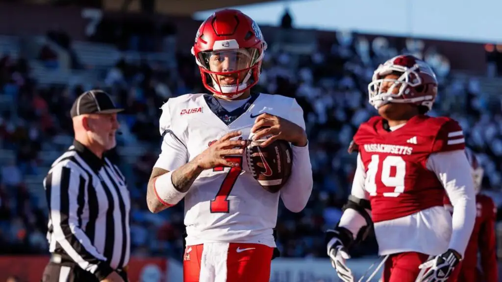 Former Liberty Flames quarterback Kaidon Salter scored a touchdown against the UMASS Minutemen