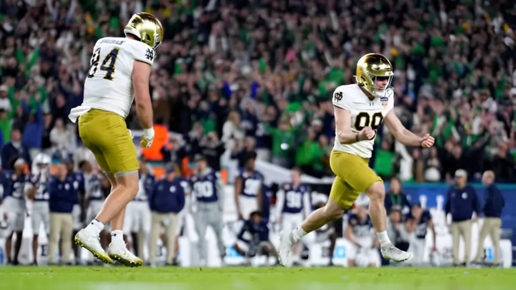 Notre Dame Fighting Irish kicker Mitch Jeter celebrates after kicking a go-ahead field goal during the fourth quarter against the Penn State Nittany Lions in the Capital One Orange Bowl 