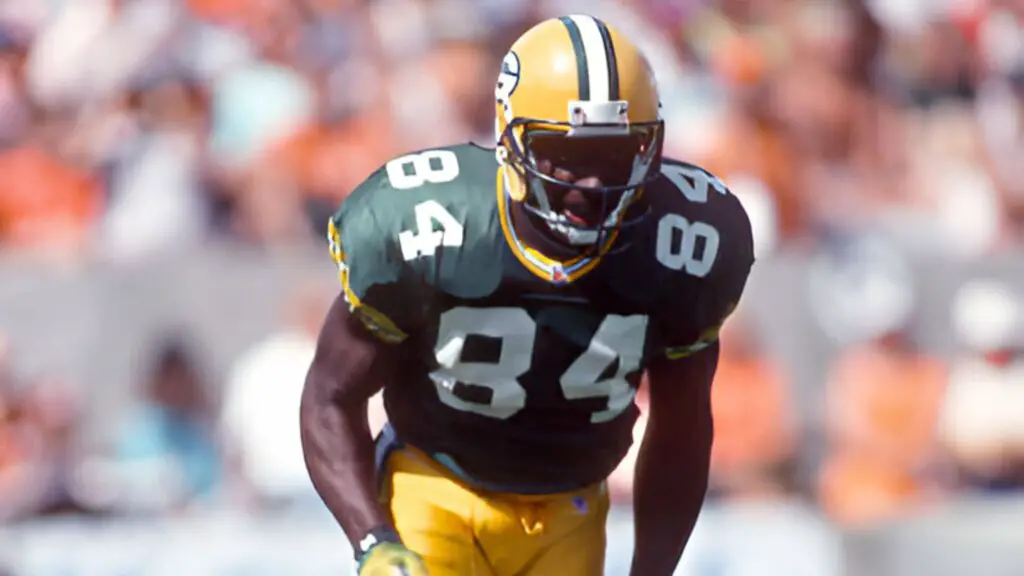 Former Green Bay Packers wide receiver Sterling Sharpe in action against the Tampa Bay Buccaneers during an NFL football game 