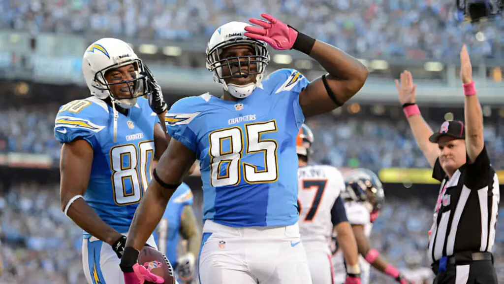 Former NFL tight end Antonio Gates celebrates his first quarter touchdown against the Denver Broncos as teammate Malcom Floyd looks on during the NFL game