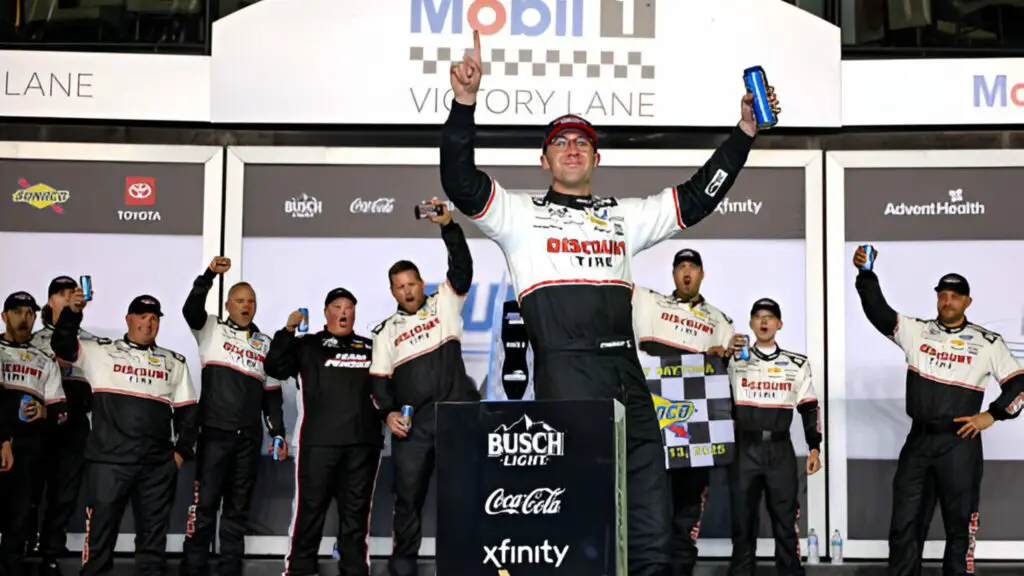 NASCAR Cup Series driver Austin Cindric celebrates in victory lane after winning the NASCAR Cup Series Duel 2