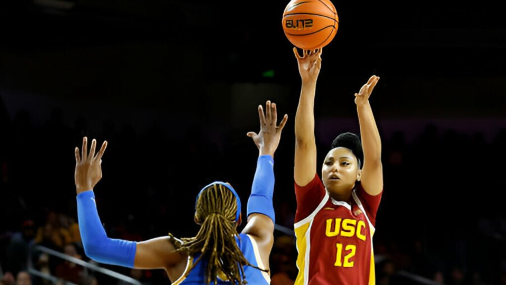 USC Trojans superstar JuJu Watkins shoots the ball over Janiah Barker against the UCLA Bruins in the first half