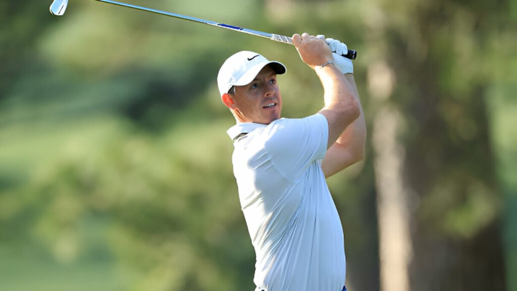Golfer Rory McIlroy hits his second shot on the 17th hole during the third round of the 2025 Masters Tournament