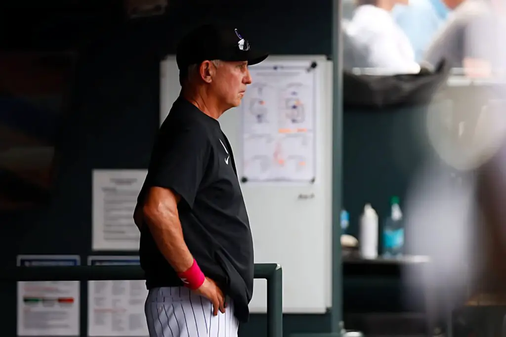Former Colorado Rockies manager Bud Black looks on from the dugout in the seventh inning against the San Diego Padres