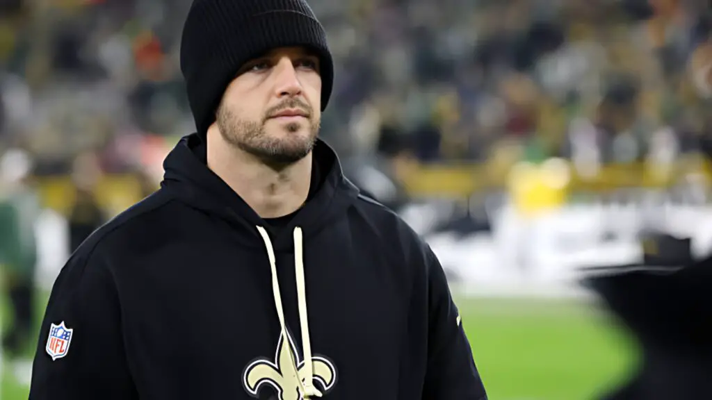 New Orleans Saints quarterback Derek Carr leaves the field following a game against the Green Bay Packers